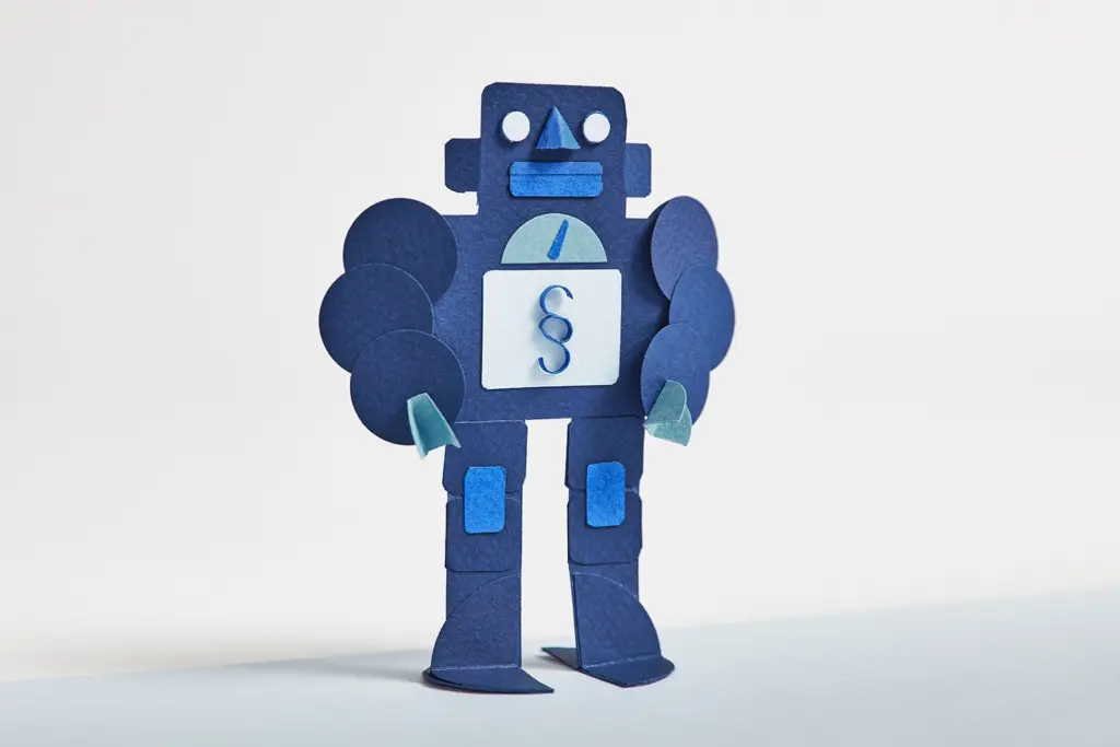 robot made of paper with a paragraph symbol on its chest