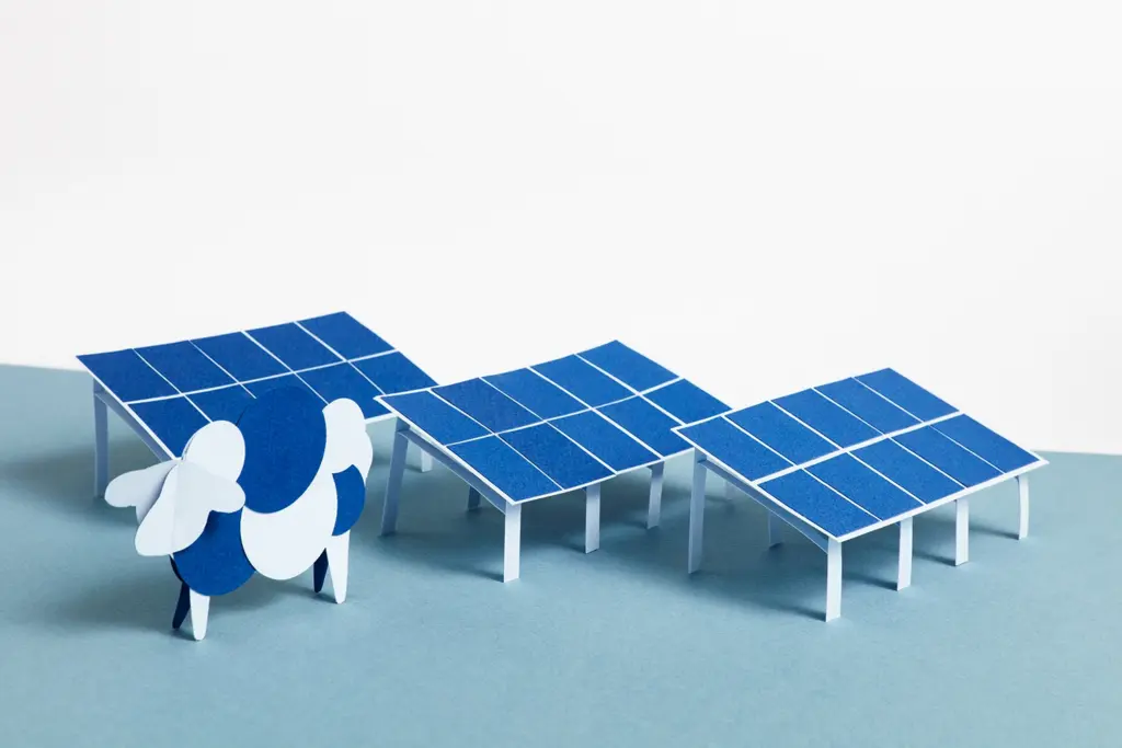 paper model of a solar park and a sheep